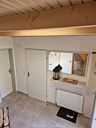 Flurbereich mit Türen zu den Zimmern