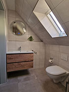 Handtuchheizung im gefliesten Bad